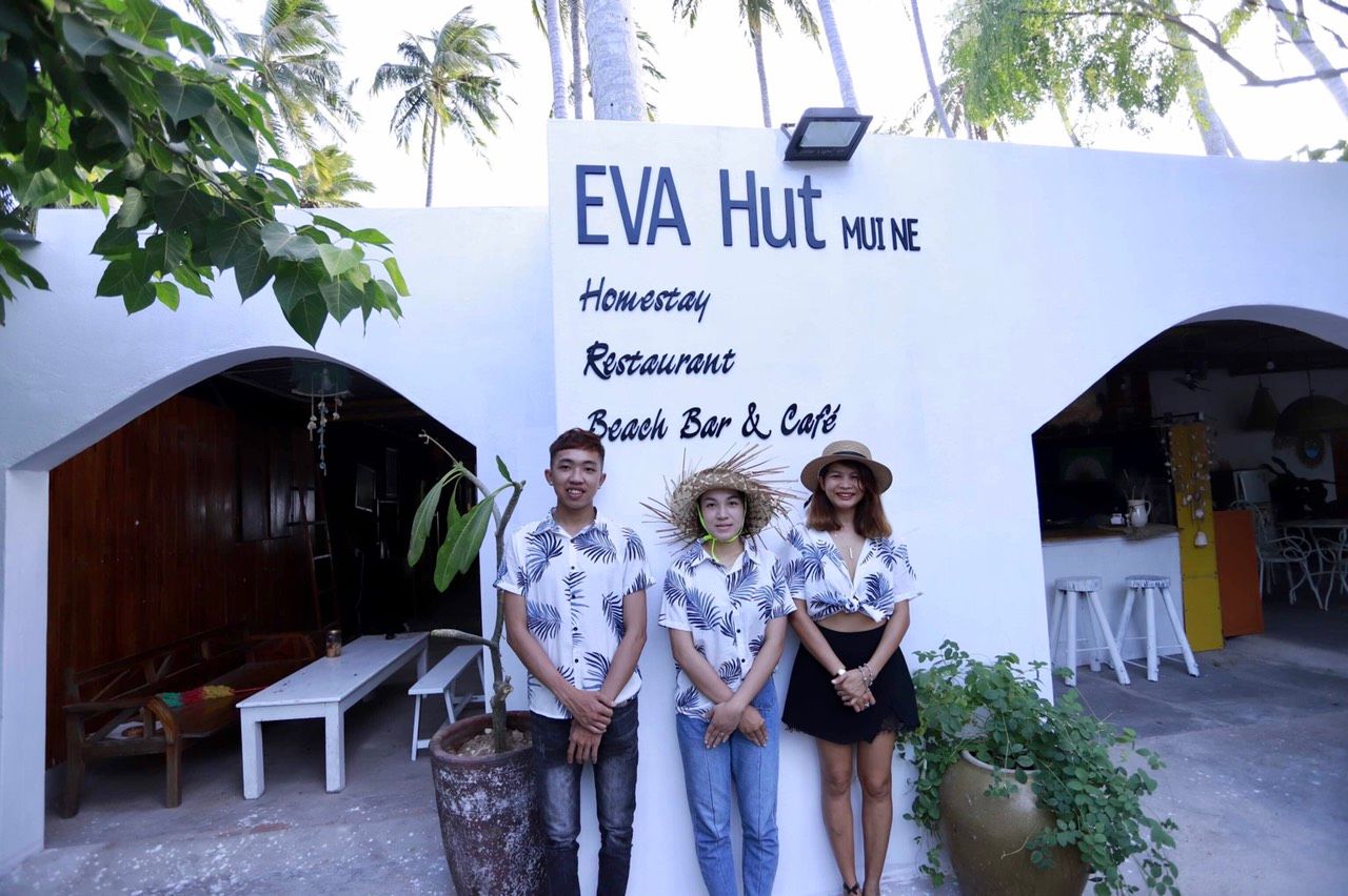 In the EVA Hut section — Hawaiian-style thatched huts, palm trees and sand flooring